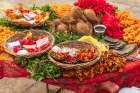 India, Uttar Pradesh, Varanasi, Bangali Tola. Flowers, coconuts, and other offerings. Art Print